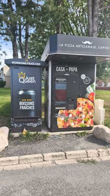 two vending machines that are on the side of the road