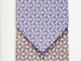 an image of a book with a tie on top of it