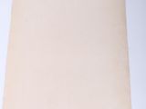 an old sheet of paper on a white surface