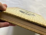 a person holding a book with a picture on it