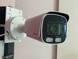 an image of a security camera mounted on a wall
