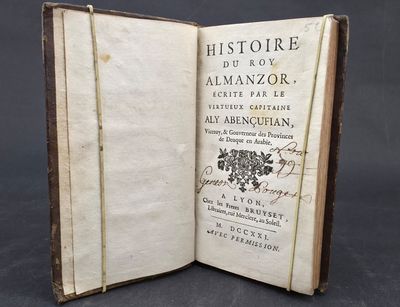 an open book with a black and white image on it