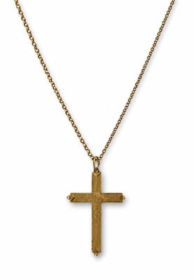 a gold cross necklace with a chain on a white background