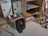 a picture of a room with a lot of clutter on the floor