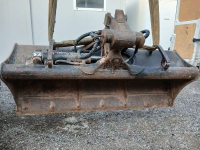 a bulldozer that is sitting on the ground