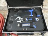a tool case with tools in it on the ground