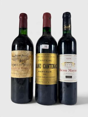 trois bouteilles de vin posées les unes à côté des autres sur une surface blanche