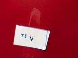 a sign on the door of a red room