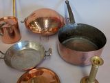 many pots and pans that are on the table