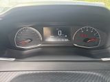 a close up of a car dashboard with a speedometer and gauges