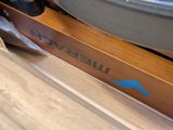 a close up of a ski that is on top of a box