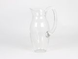 a clear glass pitcher with a handle on a white background