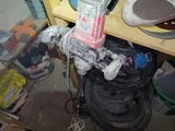 a picture of a room with a lot of stuff on the floor