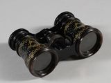 a pair of binoculars that are sitting on a table