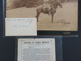an old photo of a man riding a horse in a field