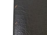 an image of a black leather wallet on a white background