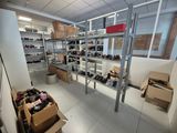 a room filled with lots of boxes and boxes of shoes