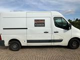 a picture of a white van parked in a parking lot
