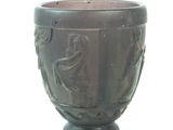 an image of a vase with a woman on it
