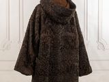 a woman ' s coat on a mannequin mannequin mannequin mannequin mannequin mannequin mannequin mannequin mann