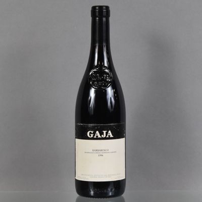a bottle of wine that is sitting on a table