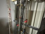 a refrigerator that is next to a wall of pipes