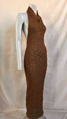 brown knitted dress on a mannequin base on a mannequin base