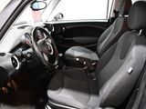 a picture of a small car with the door open