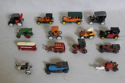many different types of toy trains and cars on the table