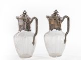 pair of silver plated glass vases with handles and handles