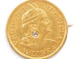 une image représentant une pièce d'or avec un diamant au centre