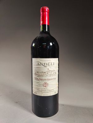 a bottle of wine that is sitting on a table