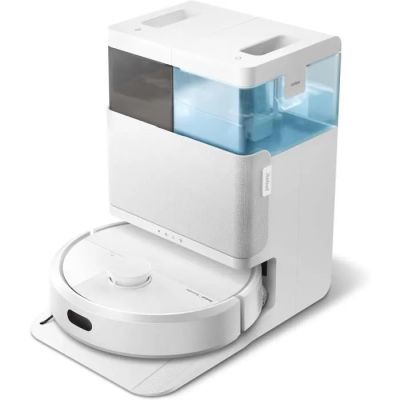 un distributeur d'eau blanc et bleu posé sur un plan de travail blanc