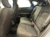 the back seats of a car are empty with no one in it
