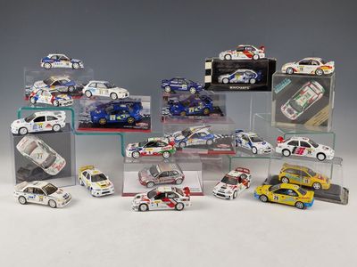 a lot of toy cars that are in a display case