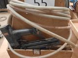 a box with a bunch of tools in it on a table