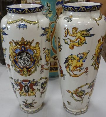 two vases that are sitting on a table