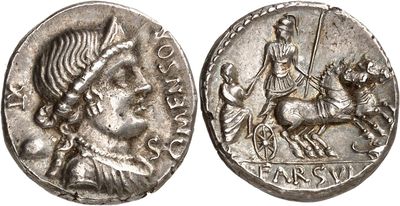 a silver coin with an image of a man on a horse