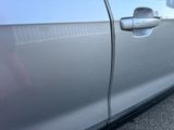 a close up of a car door handle and the door handle is missing