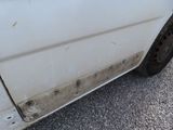 an image of a car that has been badly repaired