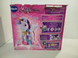 the box is open to show the contents of the toy