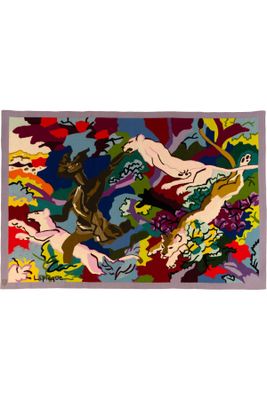 une image représentant un tapis orné de chevaux et de fleurs