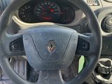 dashboard of a car with a steering wheel and dashboard gauges