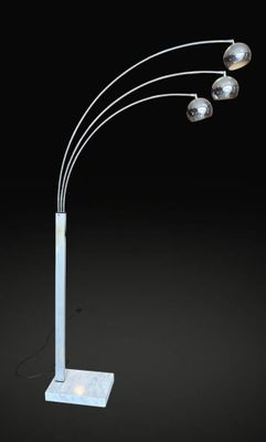 a white floor lamp with three lights and a white base