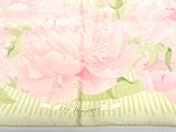 a picture of a pink flower on a green and white background