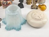 a lot of glass items that are on the table
