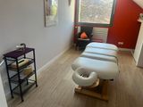 an image of a room with a massage table in it