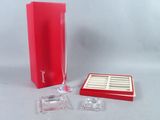 an image of a red box with a pair of glasses in it