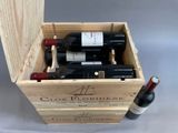 two bottles of wine in a wooden box