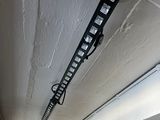a picture of a picture of a ladder hanging from the ceiling